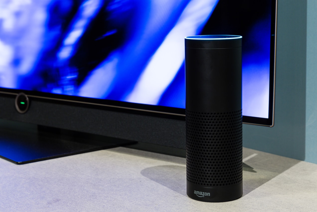 Amazon speaker next to a television