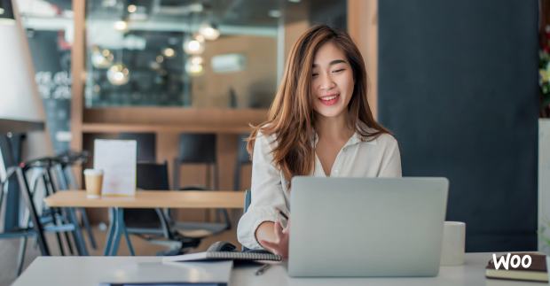 female business owner checking her email