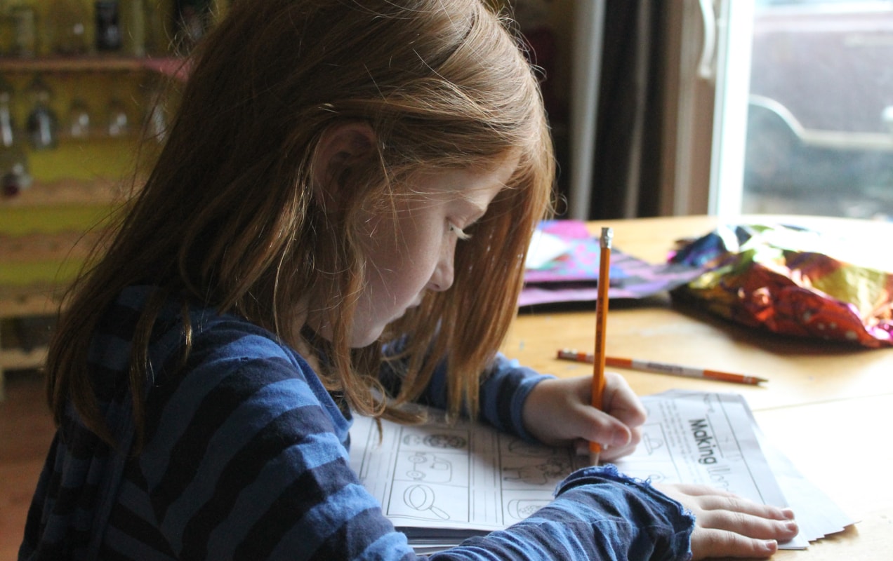 elementary student working on homework