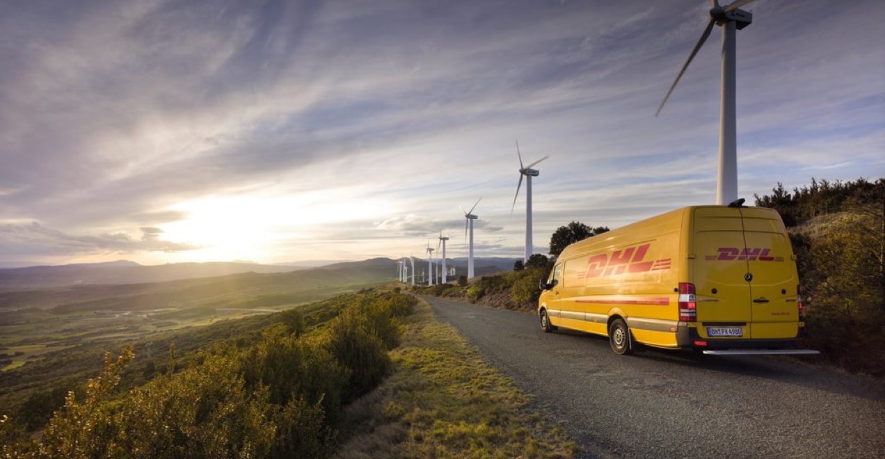 DHL truck driving down a highway