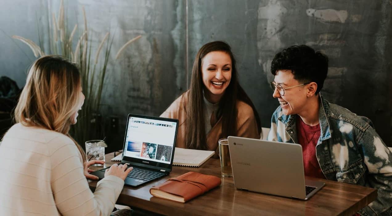 group of people working together around a table